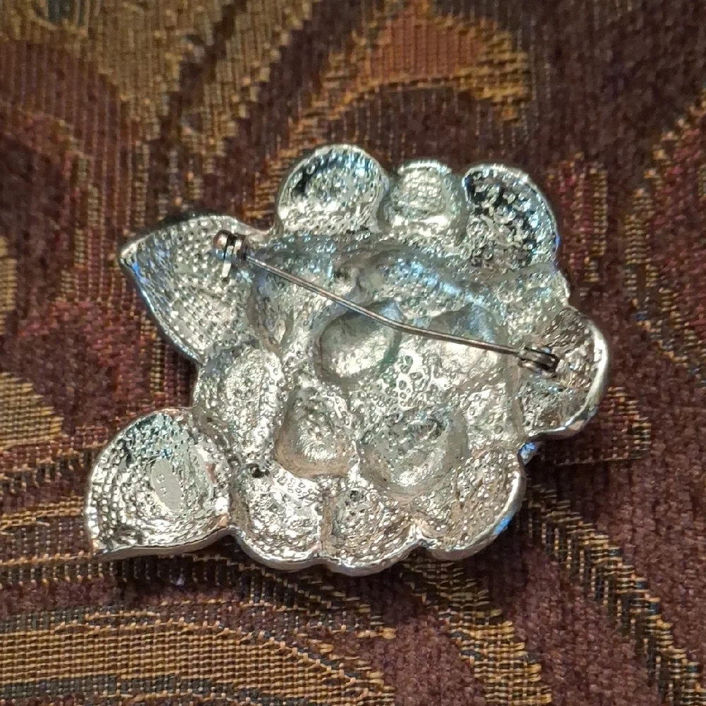 Elegant Silver Floral Brooch